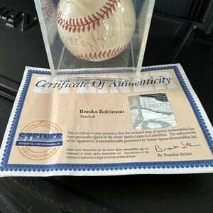 Brooks Robinson autographed baseball. “16 Gold Gloves”